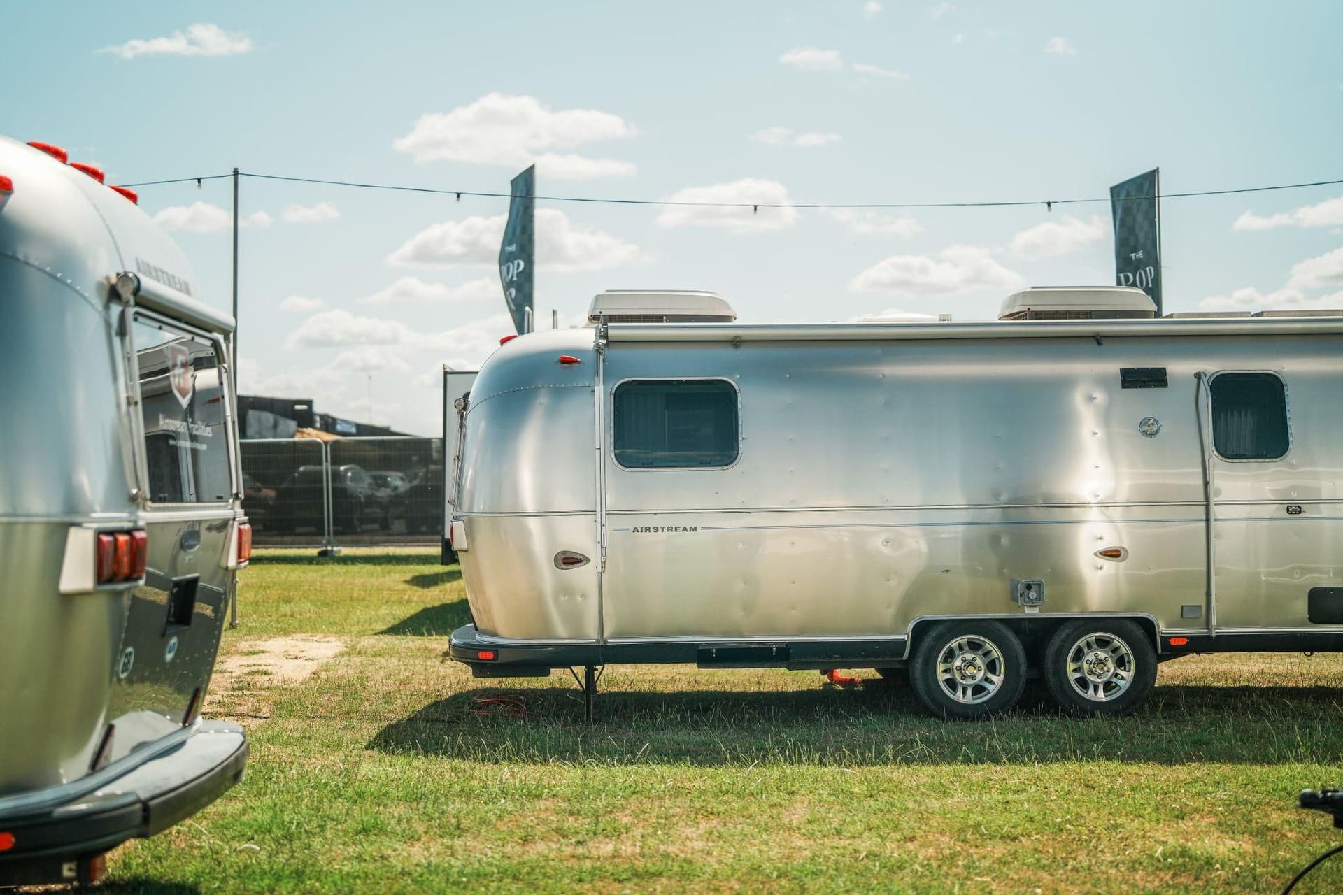 Polished Airstreams on the grass inside Silverstone Circuit